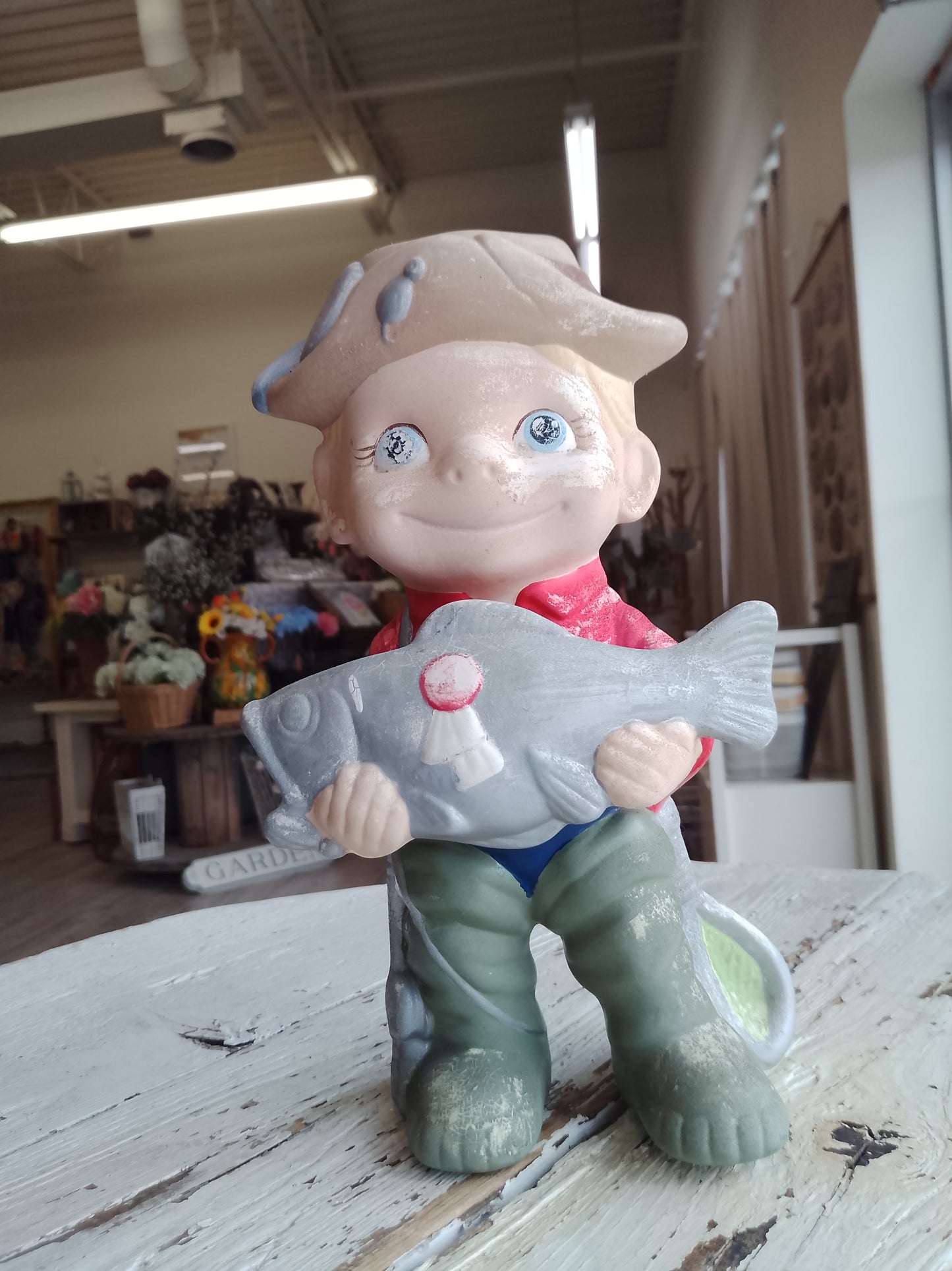 Ceramic Boy holding Fish