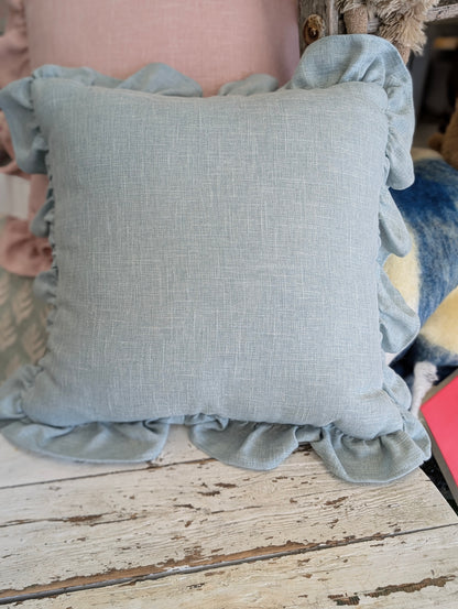 Blue ruffle pillow