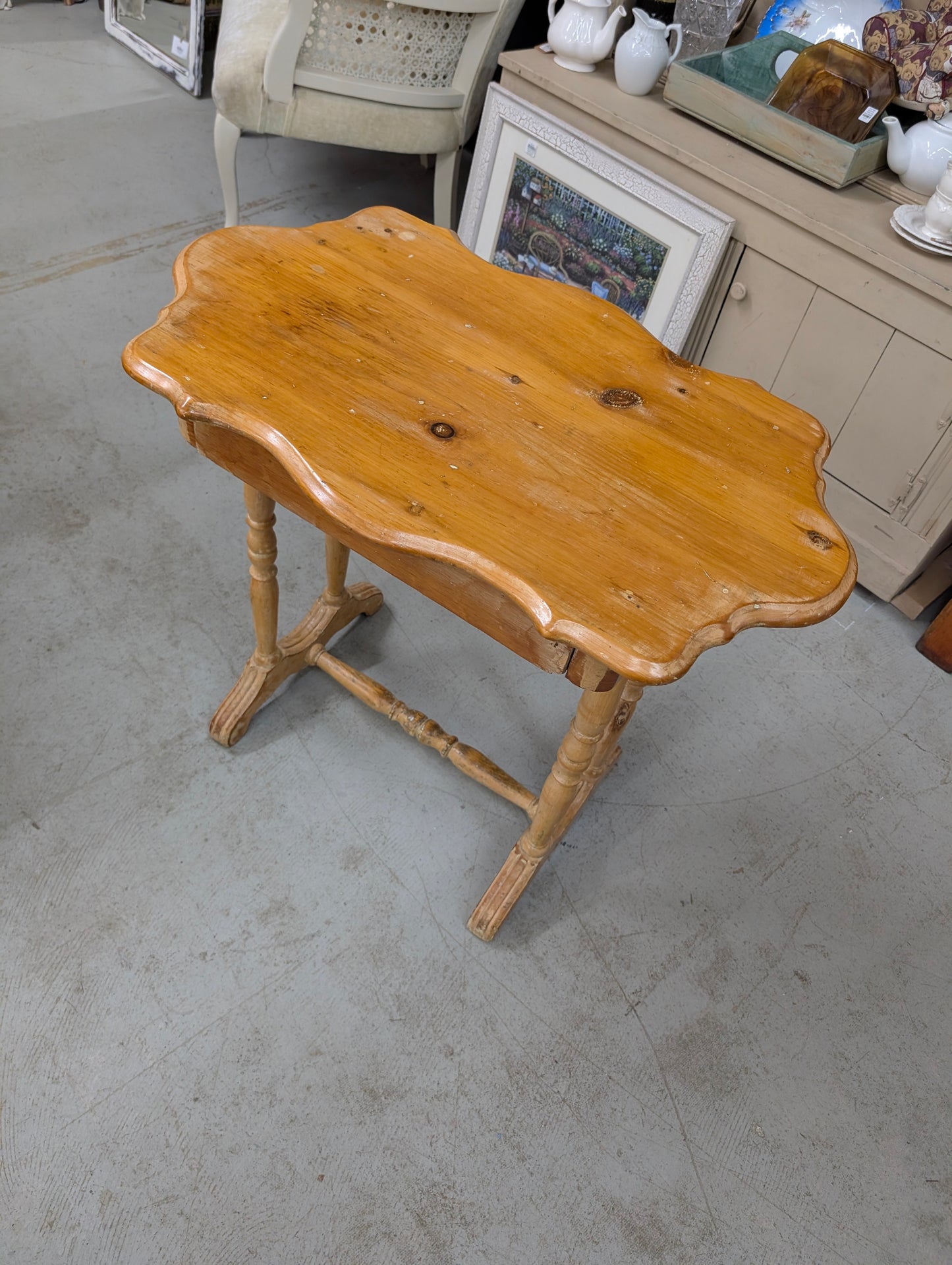 Curved pine side table