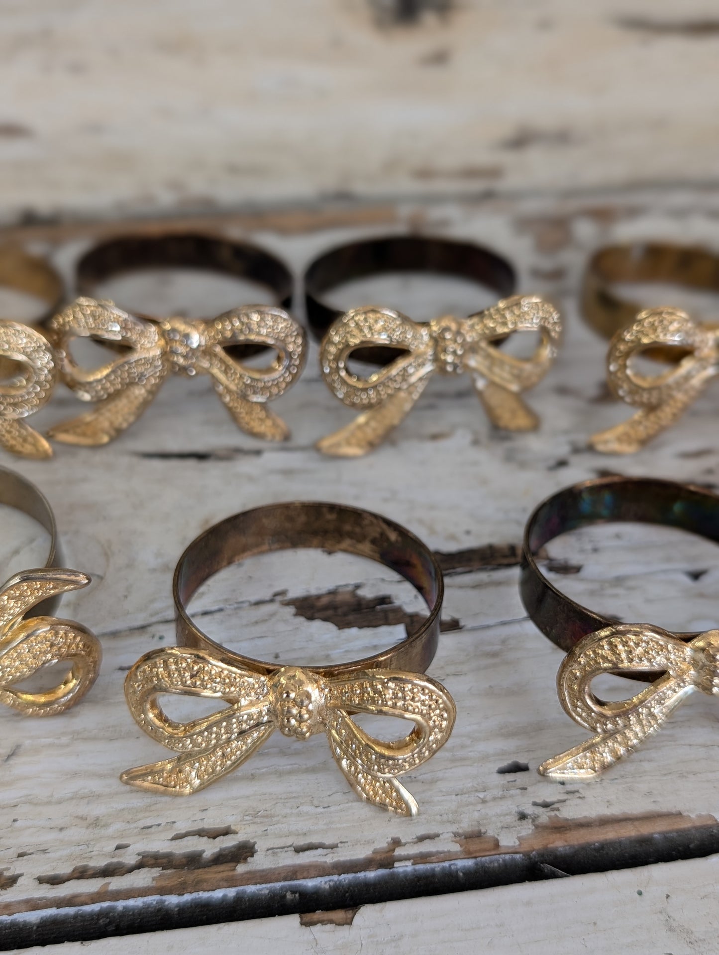 Gilded bow napkin holder set of 10