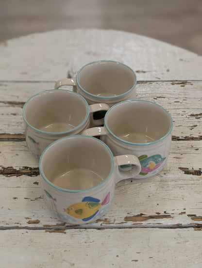 Set of 4 Studio Nova ceramic mugs