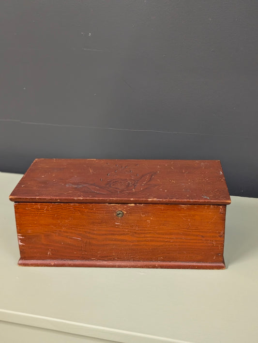 Wooden box with carvings