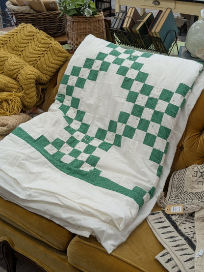 Green and white quilt