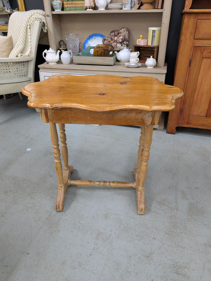 Curved pine side table