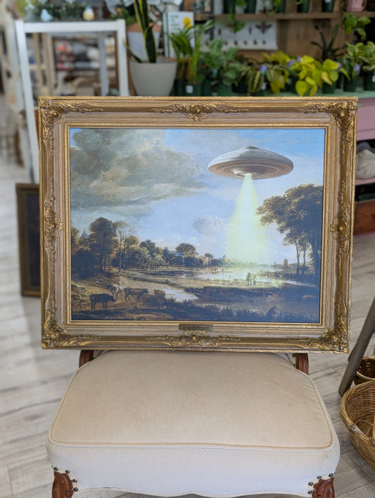 Ornate frame with alien print