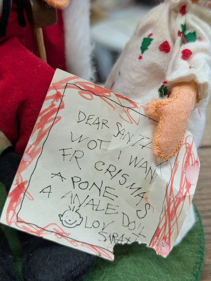 Annalee Santa with child